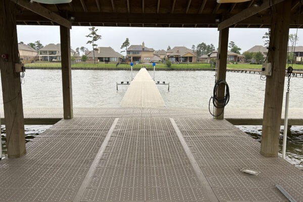 How Do Custom Boat Houses Improve Waterfront Property Value Today